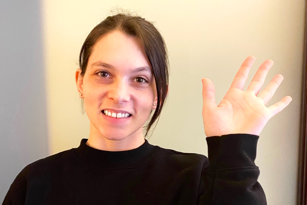 woman raising hand